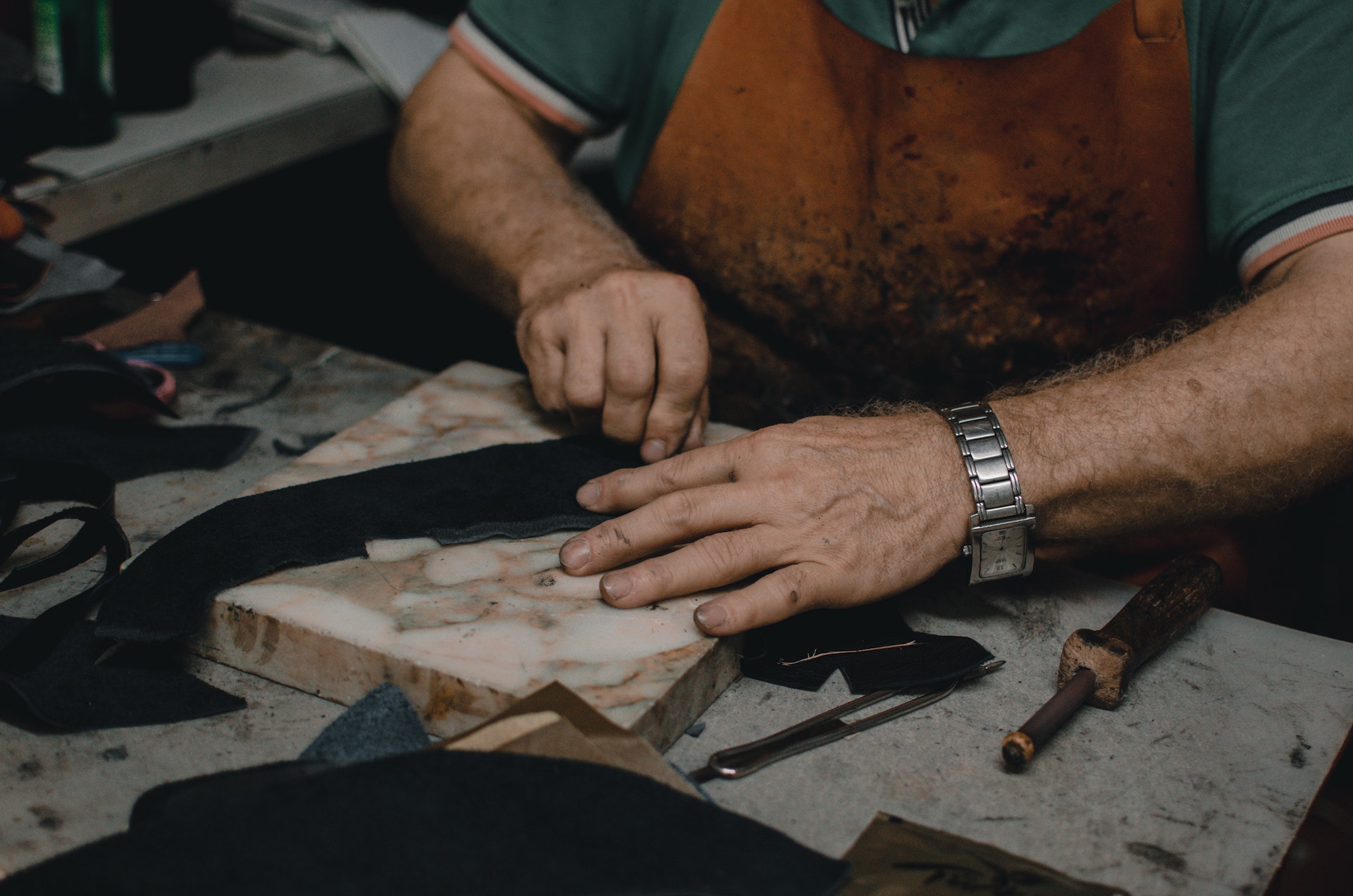 hands of leatherworker